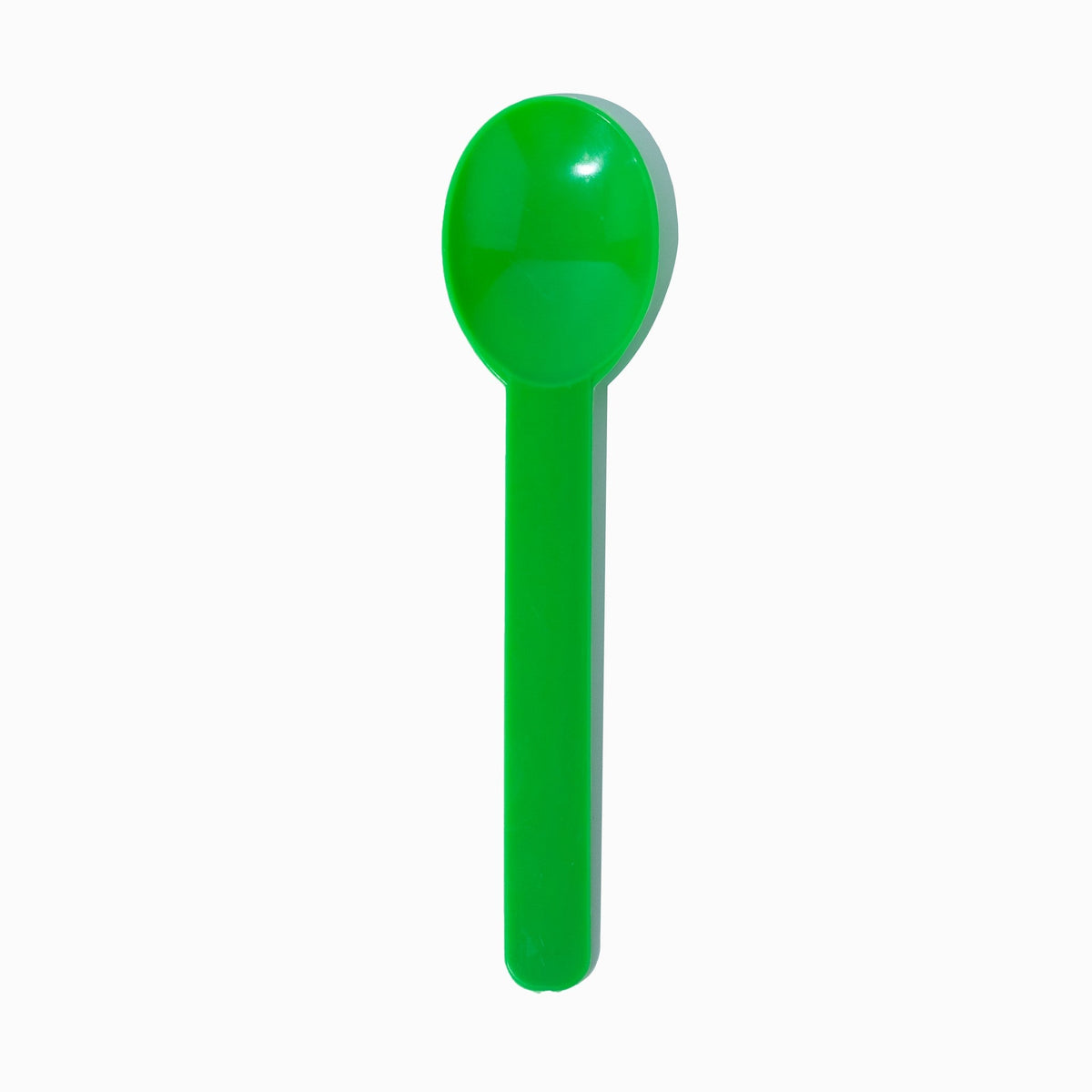 Green eco-friendly heavy duty dessert spoons stacked and ready to serve