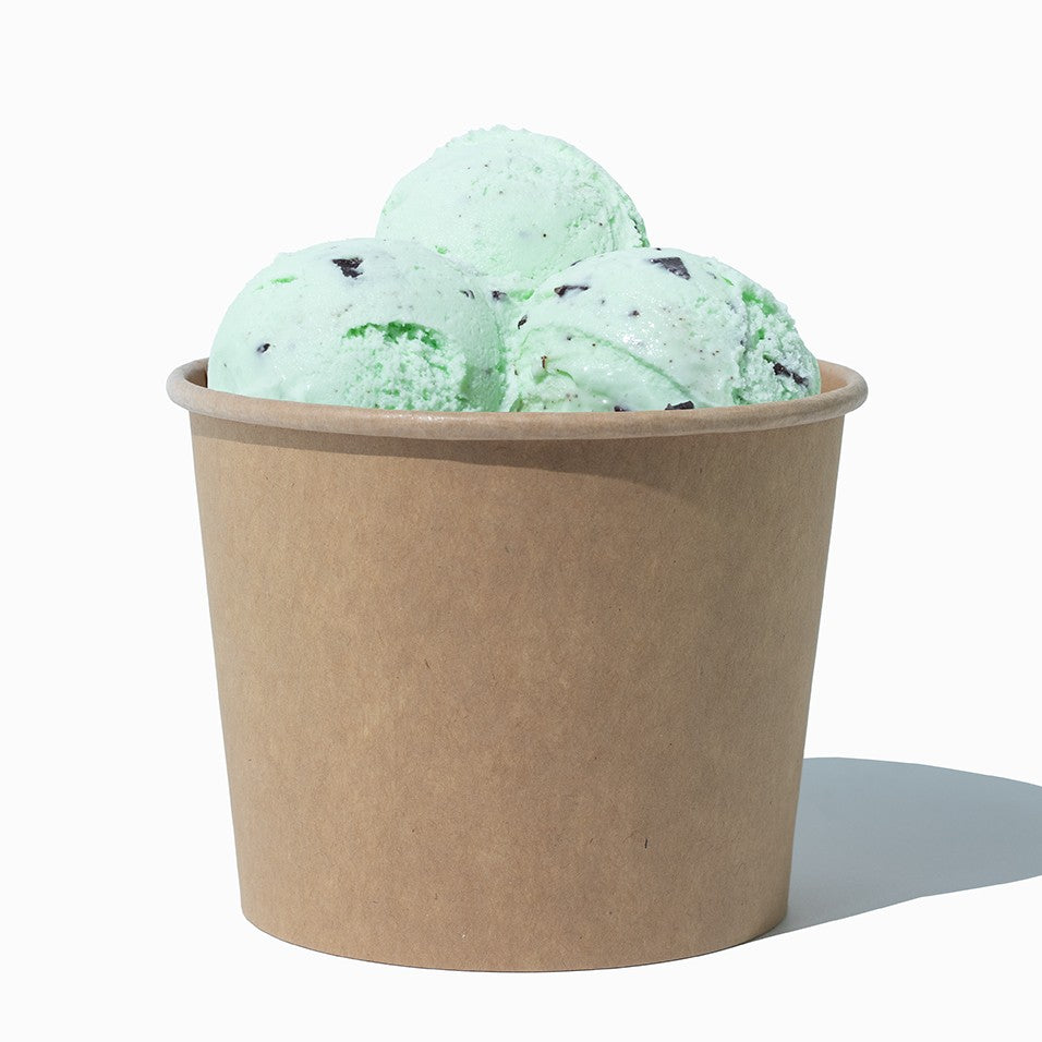 Close-up of 12 oz kraft compostable ice cream cups stacked and ready to serve