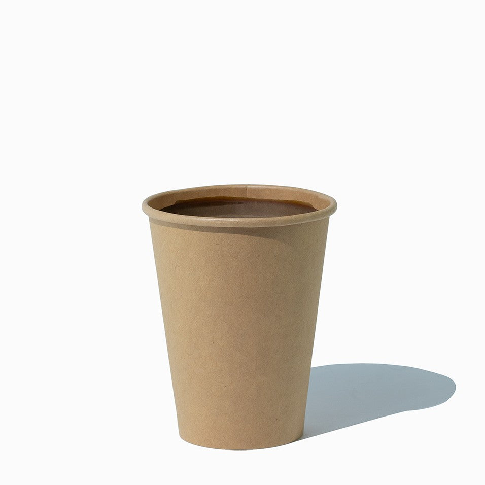 Close-up of 12 oz kraft paper ice cream cups stacked and ready to serve