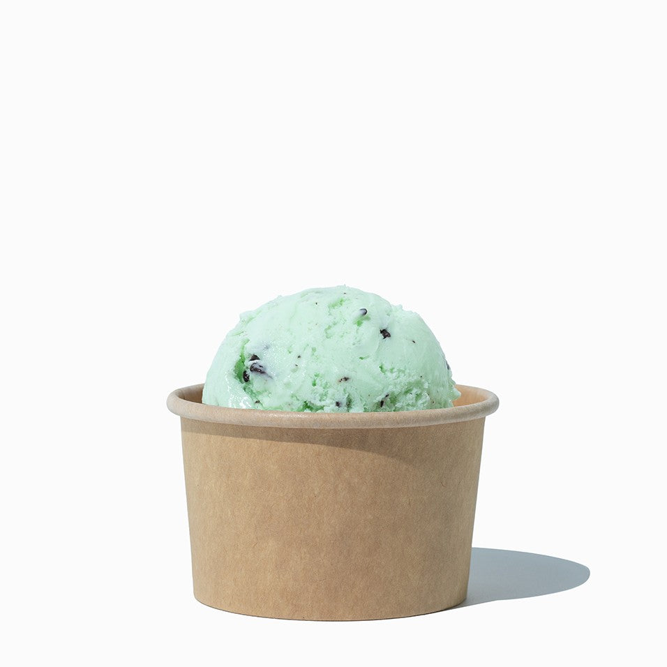 Close-up of 4 oz kraft compostable ice cream cups stacked and ready to serve