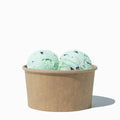 Close-up of 6 oz kraft compostable ice cream cups stacked and ready to serve