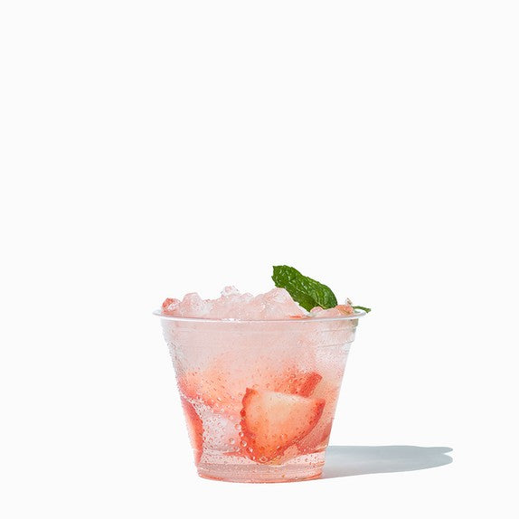 Close-up of 9 oz clear pet ice cream cups stacked and ready to serve