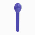 Close-up of purple compostable tasting spoons stacked and ready to serve