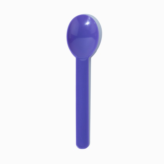 Close-up of purple compostable tasting spoons stacked and ready to serve