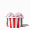 Close-up of 6 oz red ice cream cups stacked and ready to serve