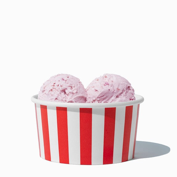 Close-up of 6 oz red ice cream cups stacked and ready to serve