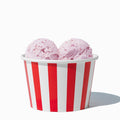 Close-up of 8 oz red ice cream cups stacked and ready to serve