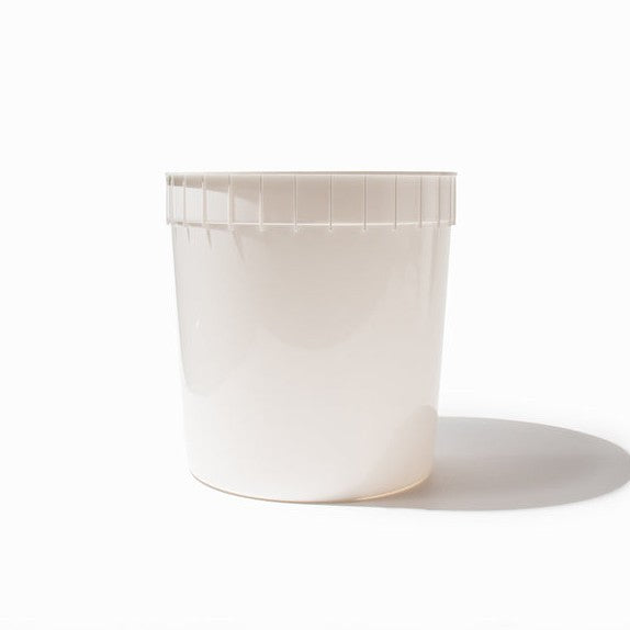 Close-up of 2.5 Gallon plastic ice cream tubs stacked and ready to serve