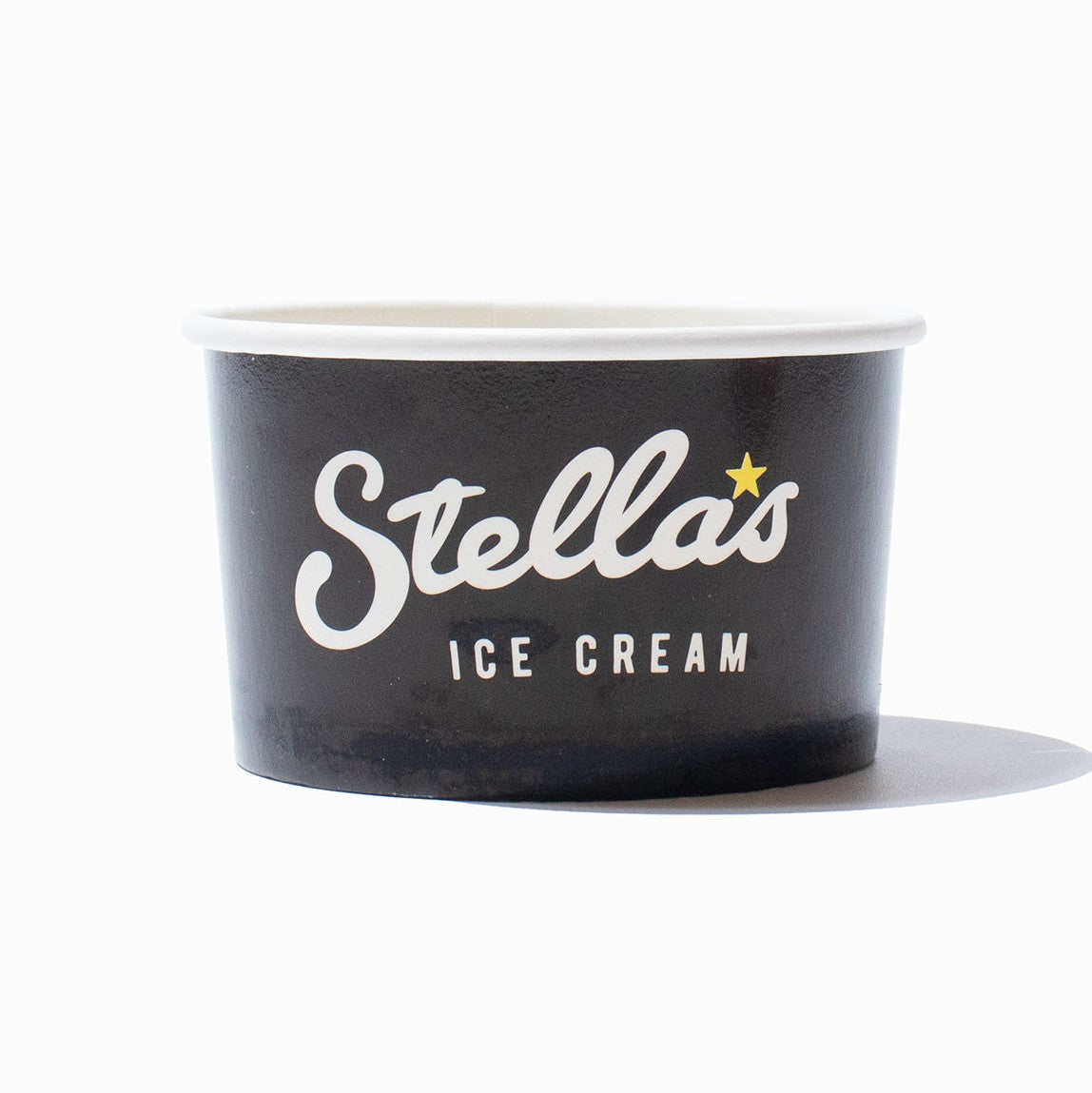 Close-up of 5 oz ice cream cups stacked and ready to serve