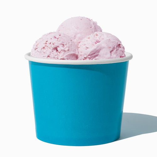 Close-up of 12 oz blue ice cream cups stacked and ready to serve