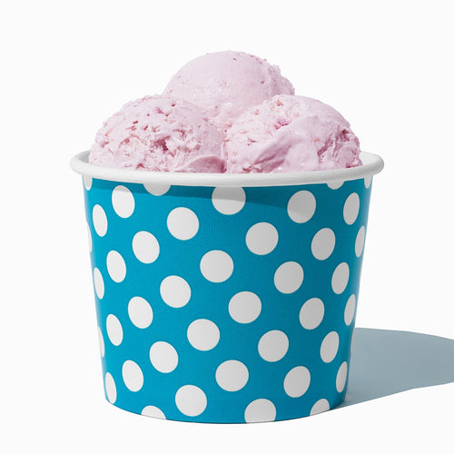 Close-up of 12 oz blue ice cream cups stacked and ready to serve