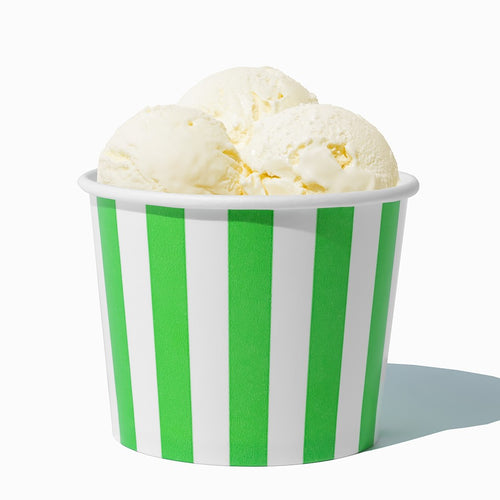 Close-up of 12 oz green ice cream cups stacked and ready to serve