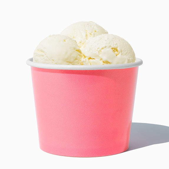 Close-up of 12 oz pink ice cream cups stacked and ready to serve