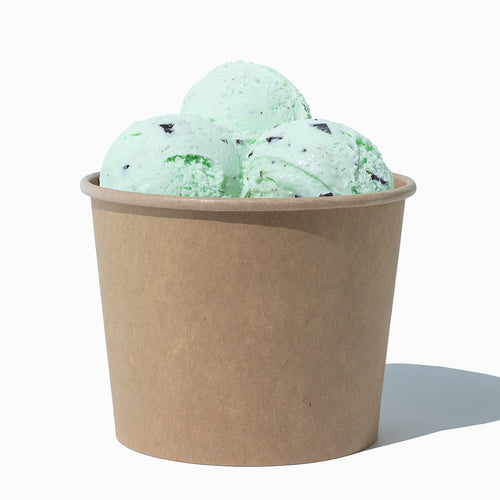 Close-up of 12 oz kraft compostable ice cream cups stacked and ready to serve