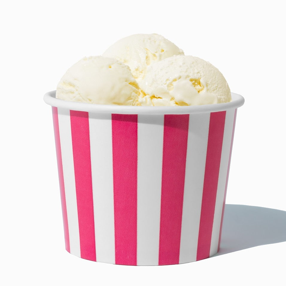 Close-up of 12 oz pink ice cream cups stacked and ready to serve
