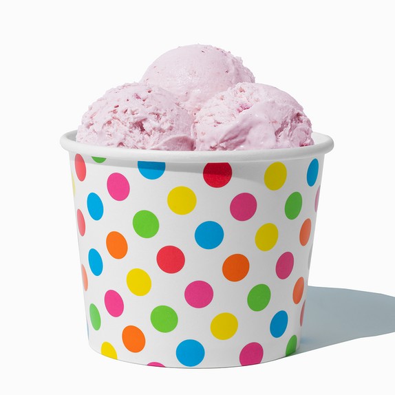 Close-up of 12 oz rainbow ice cream cups stacked and ready to serve