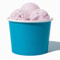 Close-up of 16 oz blue ice cream cups stacked and ready to serve
