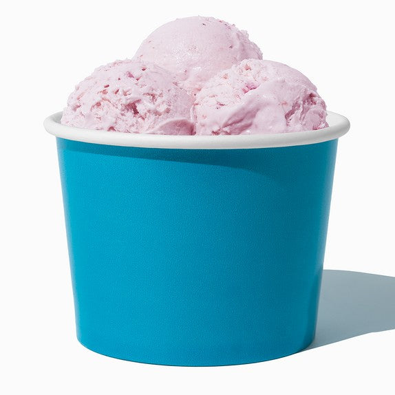 Close-up of 16 oz blue ice cream cups stacked and ready to serve