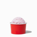 Close-up of 3 oz red paper ice cream cups stacked and ready to serve