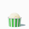 Close-up of 4 oz green ice cream cups stacked and ready to serve