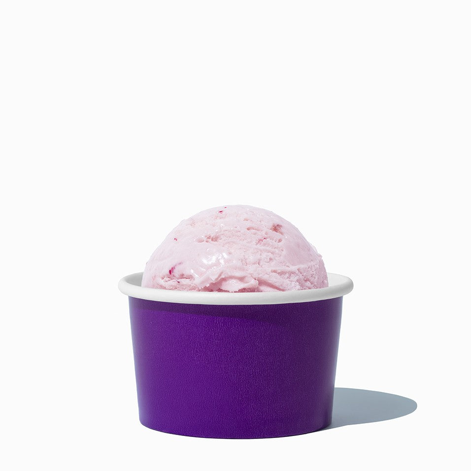 Close-up of 4 oz purple ice cream cups stacked and ready to serve