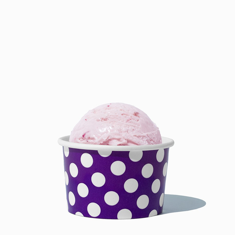Close-up of 4 oz purple ice cream cups stacked and ready to serve