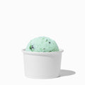 Close-up of 4 oz white ice cream cups stacked and ready to serve