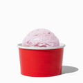Close-up of 5 oz red ice cream cups stacked and ready to serve