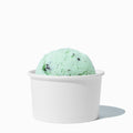 Close-up of 5 oz white ice cream cups stacked and ready to serve