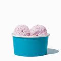 Close-up of 6 oz blue ice cream cups stacked and ready to serve