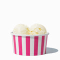Close-up of 6 oz pink ice cream cups stacked and ready to serve