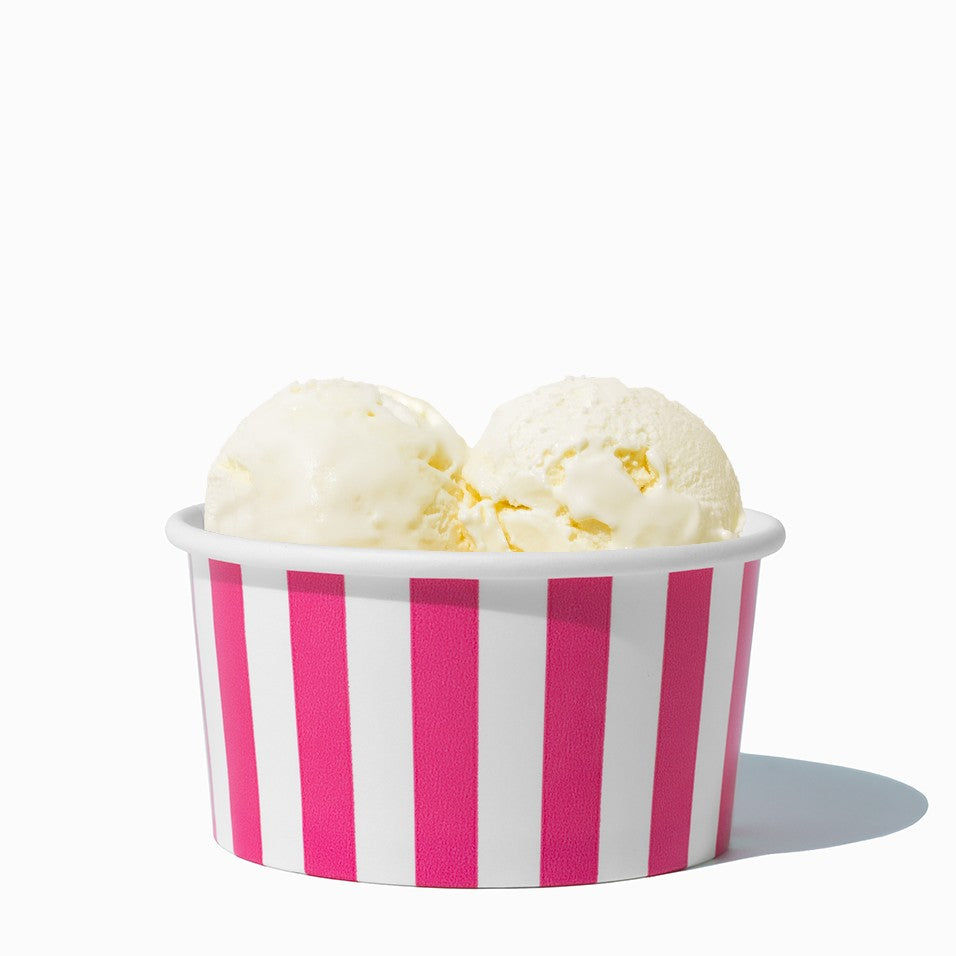 Close-up of 6 oz pink ice cream cups stacked and ready to serve