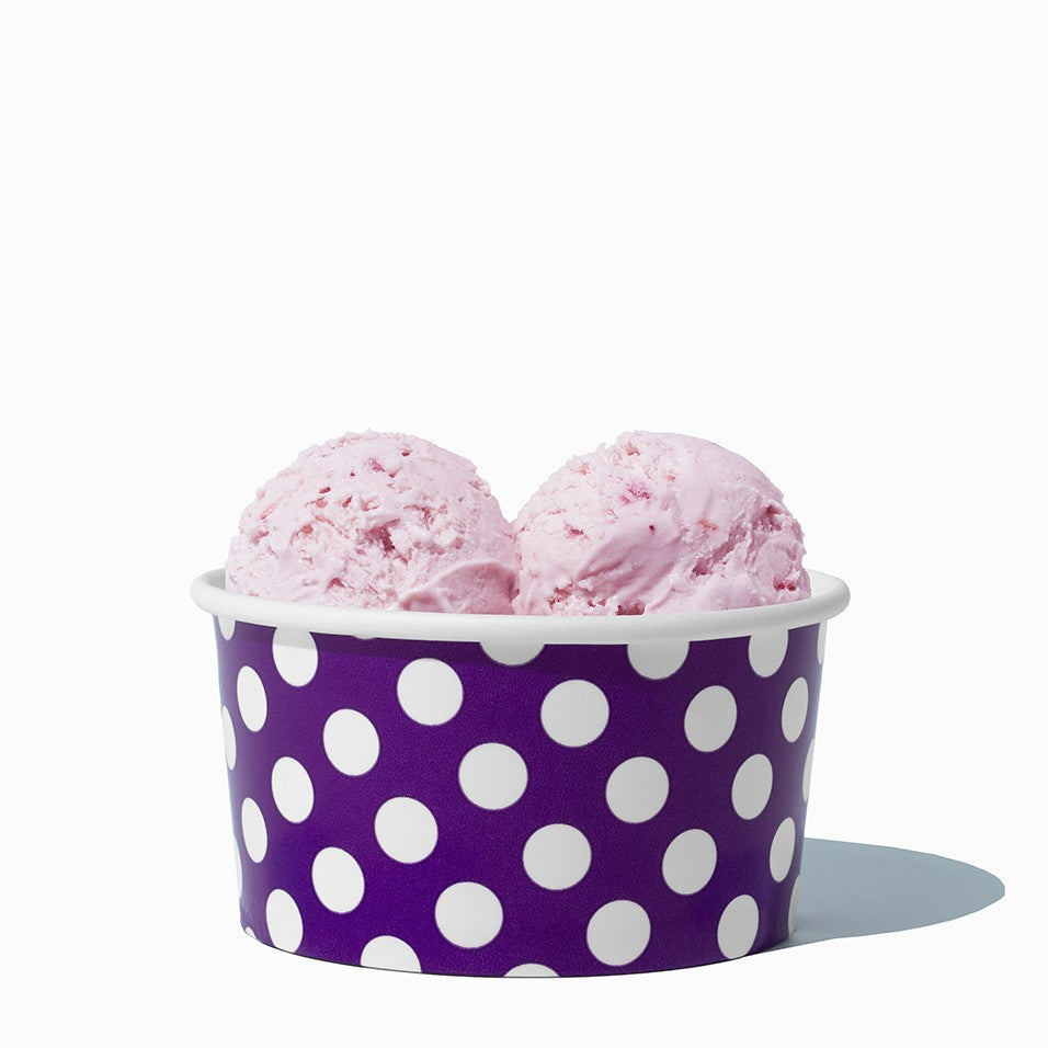 Close-up of 6 oz purple ice cream cups stacked and ready to serve