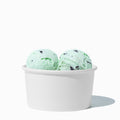 Close-up of 6 oz white paper ice cream cups stacked and ready to serve