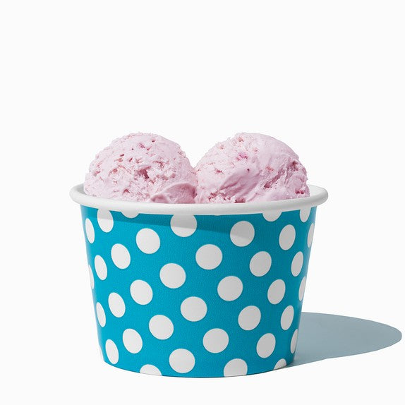 Close-up of 8 oz blue ice cream cups stacked and ready to serve