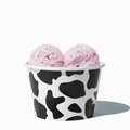 Close-up of 8 oz black ice cream cups stacked and ready to serve