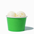 Close-up of 8 oz green ice cream cups stacked and ready to serve