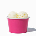 Close-up of 8 oz pink ice cream cups stacked and ready to serve