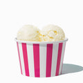 Close-up of 8 oz pink ice cream cups stacked and ready to serve