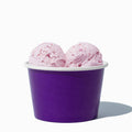 Close-up of 8 oz purple ice cream cups stacked and ready to serve