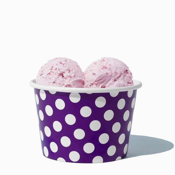 Close-up of 8 oz purple ice cream cups stacked and ready to serve