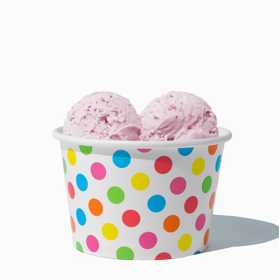 Close-up of 8 oz rainbow ice cream cups stacked and ready to serve