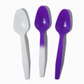 Close-up of assorted tasting spoons stacked and ready to serve