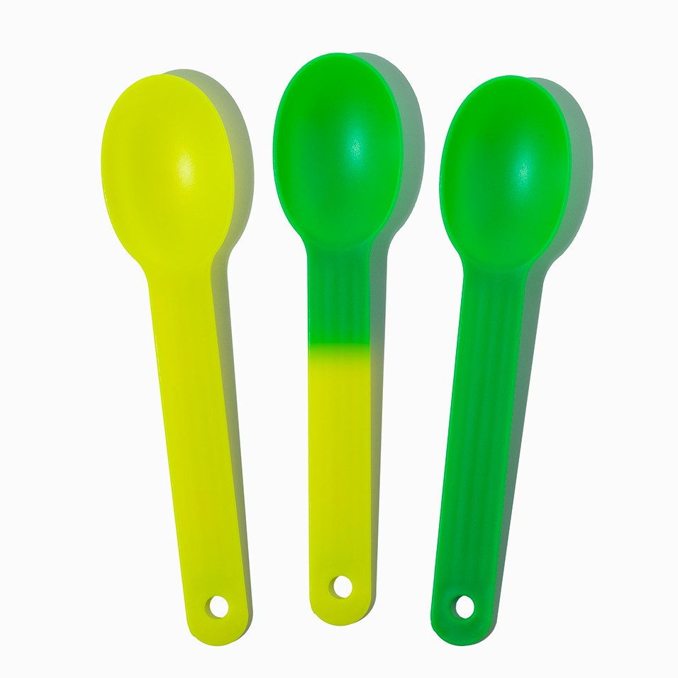 Close-up of assorted tasting spoons stacked and ready to serve