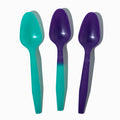 Close-up of assorted tasting spoons stacked and ready to serve