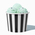Close-up of 12 oz black ice cream cups stacked and ready to serve