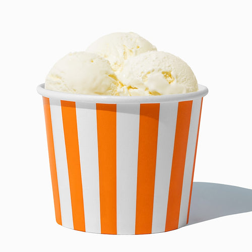 Close-up of 12 oz orange ice cream cups stacked and ready to serve