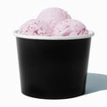 Close-up of 16 oz black paper ice cream cups stacked and ready to serve