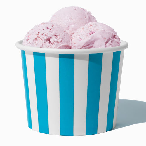 Close-up of 16 oz blue ice cream cups stacked and ready to serve