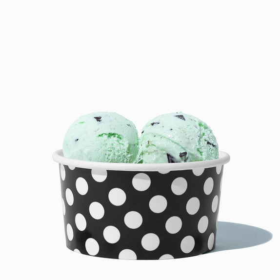 Close-up of 6 oz black paper ice cream cups stacked and ready to serve